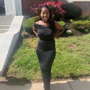 A Black ruched bodycon dress